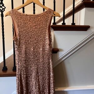 Gold sequin cocktail dress.